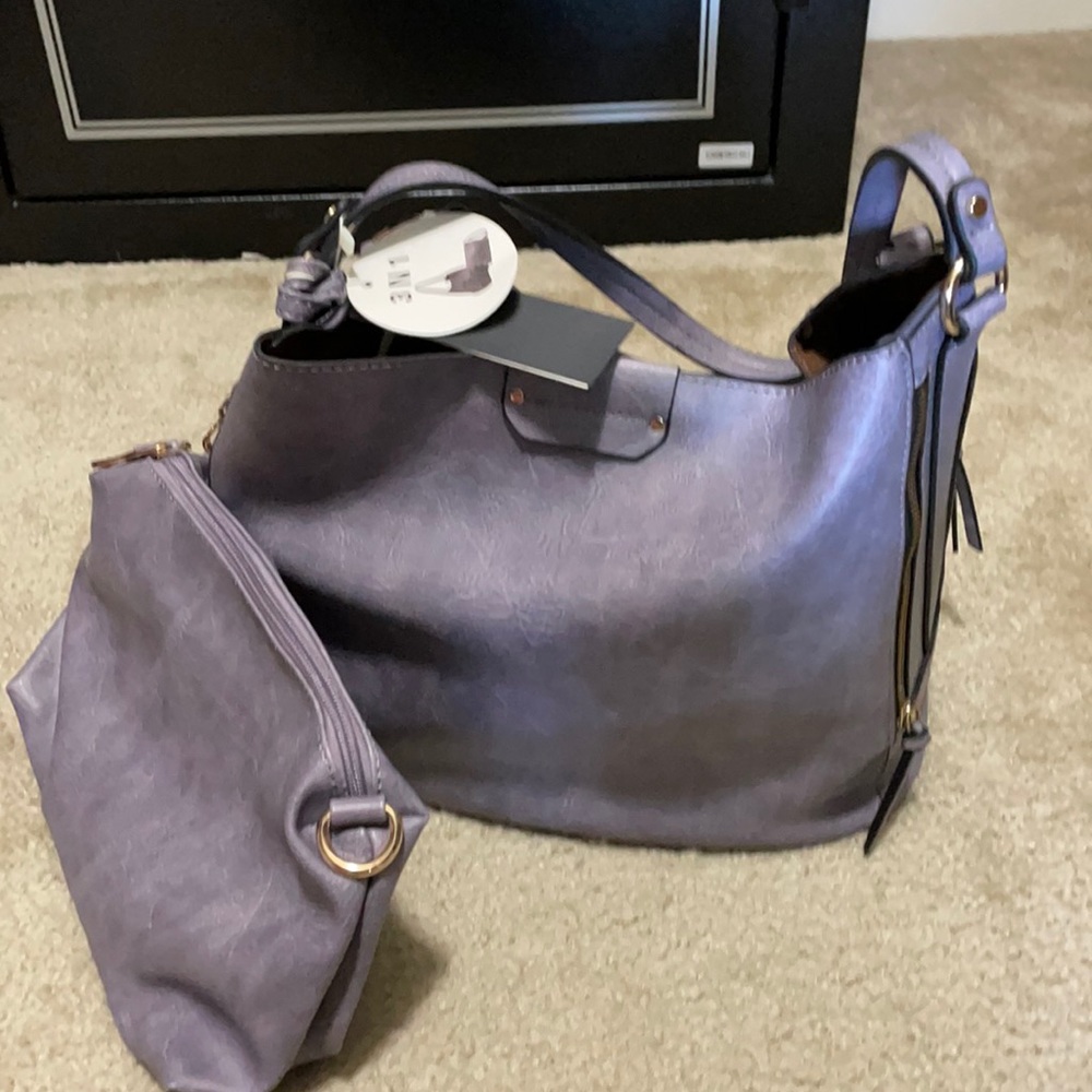Beautiful lavender 3 in 1 bag brand new never worn